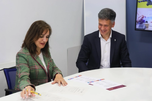 Professionals signing partnership agreement